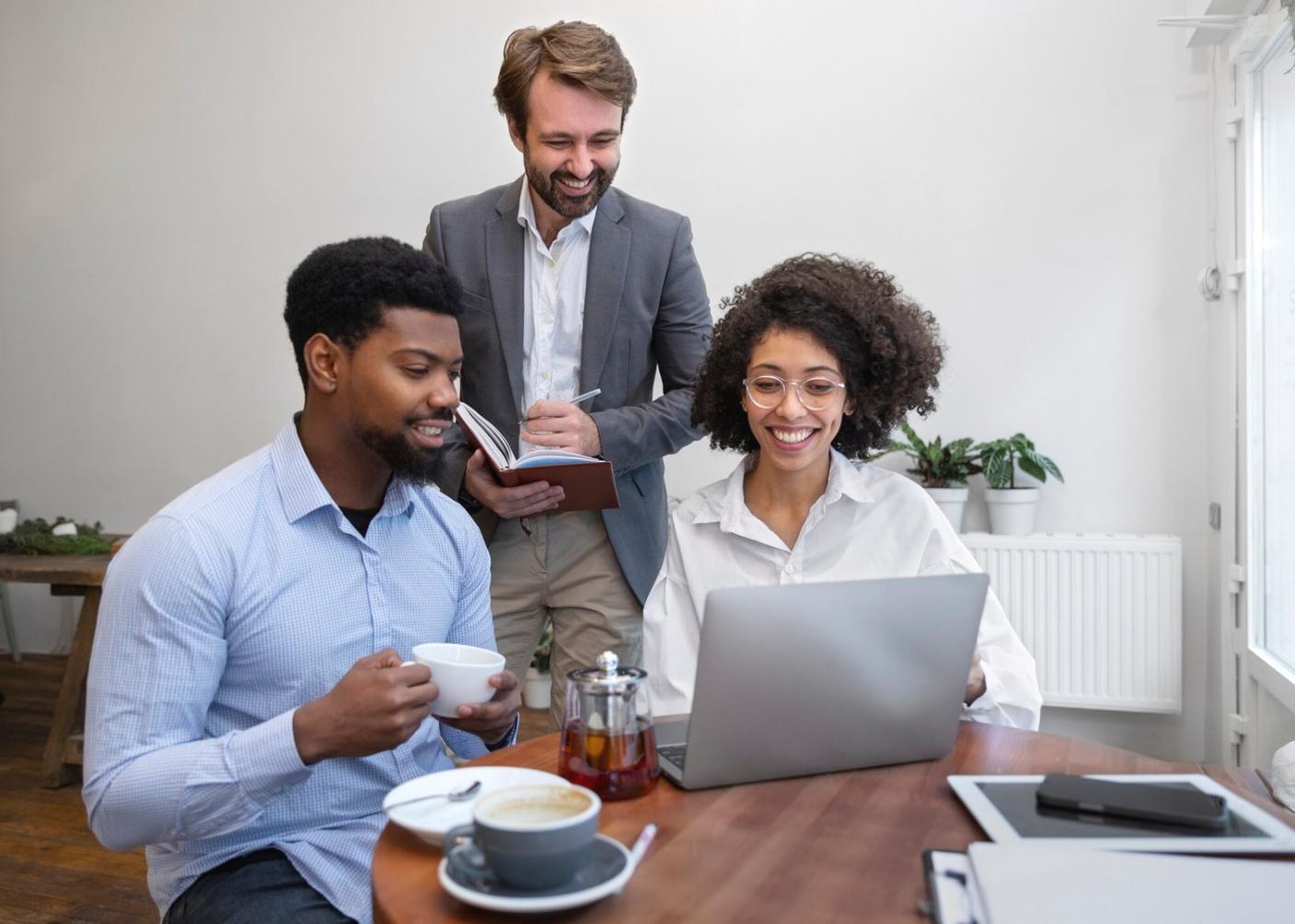 International students collaborating on e-commerce SEO projects in modern learning space
